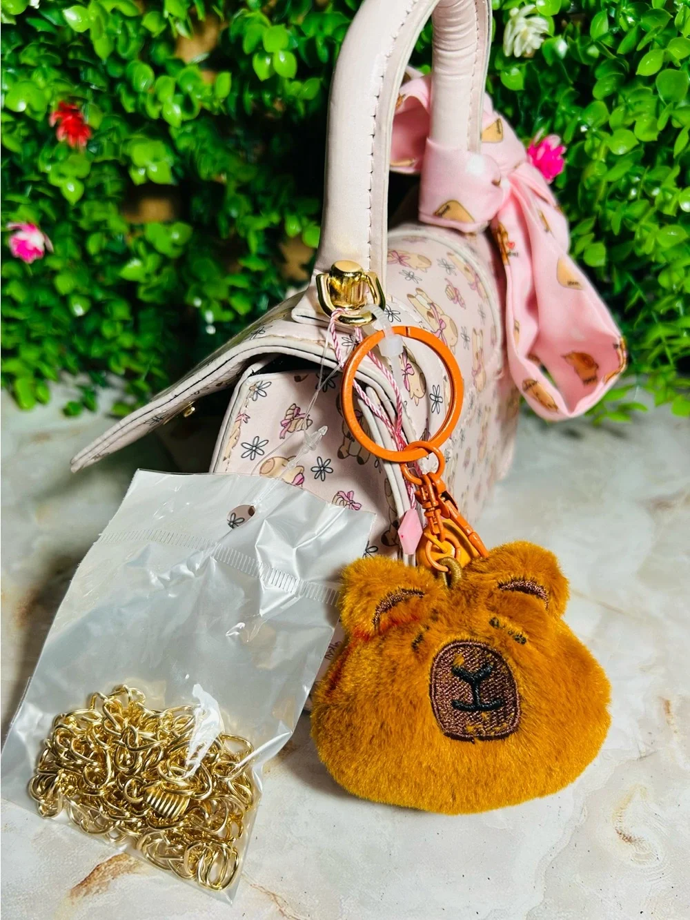 Mini hand bag with charm and pink scarf